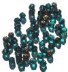 50 6mm Triangle Faceted Teal with Antique Gold Coated Ends